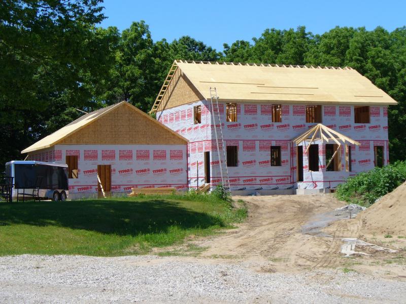 Two Story home that ECB framed